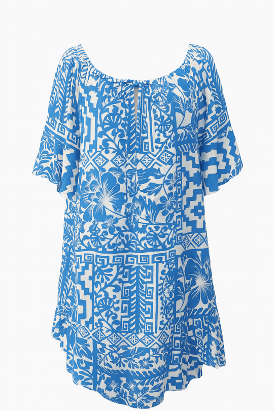 Sandy Floral Print Summer DressEmbrace island style with the Sandy Floral Print Summer Dress. Blue & white floral print, lightweight fabric, relaxed fit & tie neckline for summer comfort.